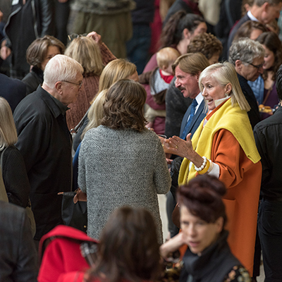 crowd of people at an art event